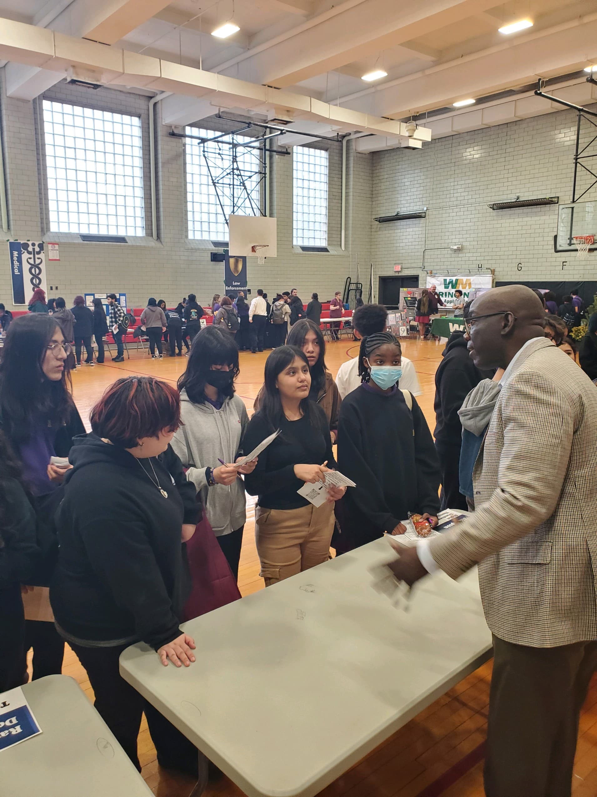 Rashan Thompson with students at a career exploration workshop